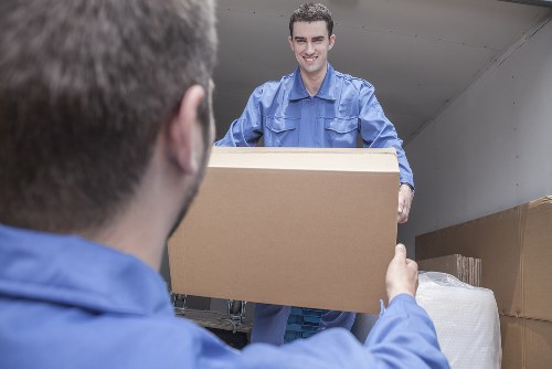 Careful loading of household items into a van