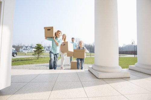 Moving team preparing boxes safely before a removal job
