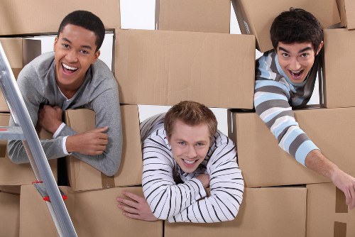 Moving team loading furniture for an office relocation in Crystalpalace