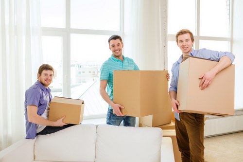 Packed office boxes and furniture ready for local commercial relocation in Crystal Palace