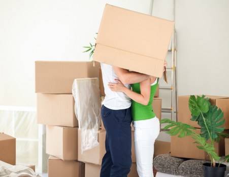 Packed office boxes and furniture ready for relocation in Crystalpalace