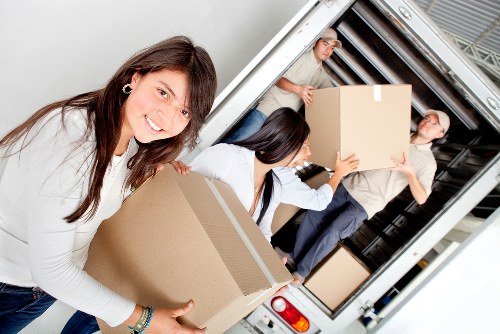 Packed boxes and furniture prepared for a local move in Crystal Palace